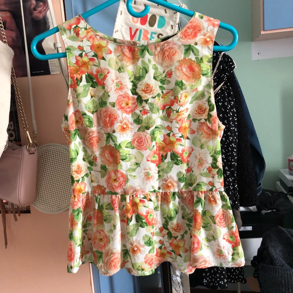 Floral Peplum top with gold buttons back detail